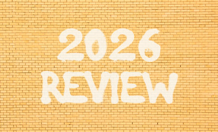 2026 Review symbol. Concept words 2026 Review on beautiful old brown brick wall. Beautiful old brown brick wall background. Business and 2026 review concept. Copy space.の写真素材