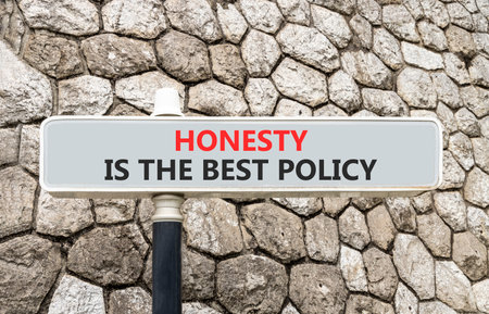 Honesty is the best policy. Concept words Honesty is the best policy on gray beautiful road sign. Beautiful stone wall background. Business honesty is the best policy concept. Copy space.の写真素材