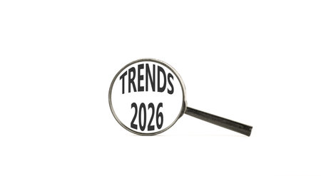 Trends 2026 new year symbol. Concept words Trends 2026 on beautiful white paper. Black magnifying...
