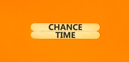 Chance time symbol. Concept word Chance time on beautiful wooden sticks. Beautiful orange paper...