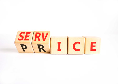 Service price symbol. Concept words Service price on beautiful wooden cubes. Beautiful white table white background. Business, service price concept. Copy space.の写真素材