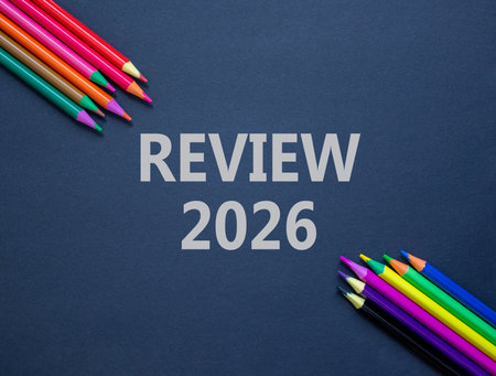 Review 2026 symbol. Concept words Review 2026 on beautiful black paper. Beautiful black paper...
