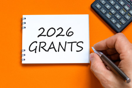 2026 Grants symbol. Concept words 2026 Grants on beautiful white note. Black calculator. Beautiful...