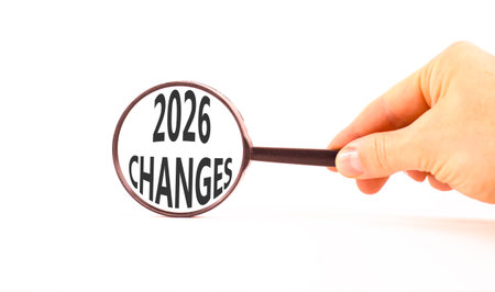 2026 Changes symbol. Concept words 2026 Changes on beautiful white paper. Black magnifying glass....