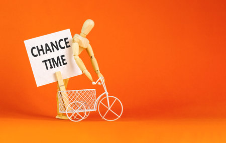 Chance time symbol. Concept word Chance time on beautiful white paper. Beautiful wooden clothespin. Beautiful orange background. Businessman's model. Business chance time concept. Copy space.の写真素材