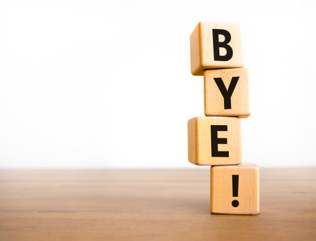 Bye symbol. Concept word Bye on beautiful wooden blocks. Beautiful wooden table white background. Business and bye concept. Copy space.の写真素材