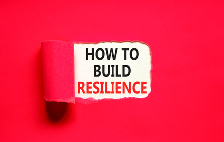 How to build resilience symbol. Concept words How to build resilience on beautiful white paper. Beautiful red paper background. Business how to build resilience concept. Copy space.の写真素材