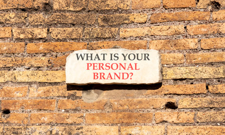 What is your personal brand symbol. Concept words What is your personal brand on white marble sign plate. Beautiful brick wall background. Business what is your personal brand concept. Copy space.の写真素材