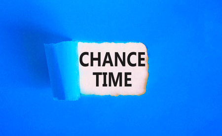 Chance time symbol. Concept word Chance time on beautiful white paper. Beautiful blue paper background. Business chance time concept. Copy space.の写真素材
