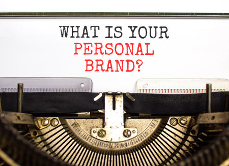 What is your personal brand symbol. Concept words What is your personal brand typed on old retro typewriter. Beautiful white paper background. Business what is your personal brand concept. Copy space.の写真素材