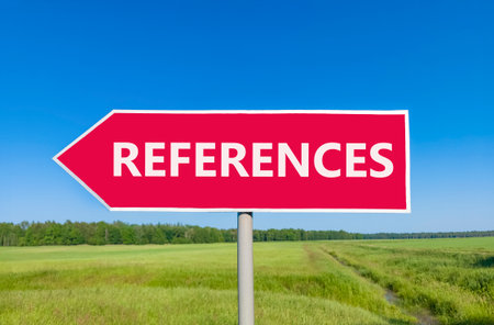 References or reference symbol. Concept word References on beautiful red road sign. Beautiful blue sky green grass forest peaceful nature background Business references or reference concept Copy spaceの写真素材