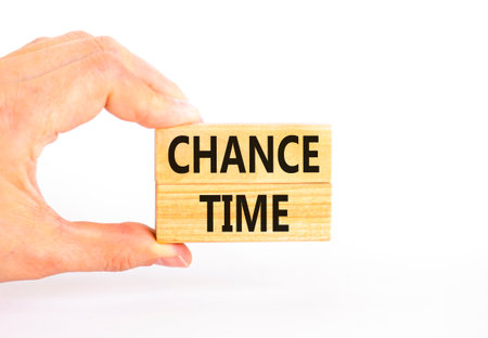Chance time symbol. Concept word Chance time on beautiful wooden blocks. Beautiful white paper...