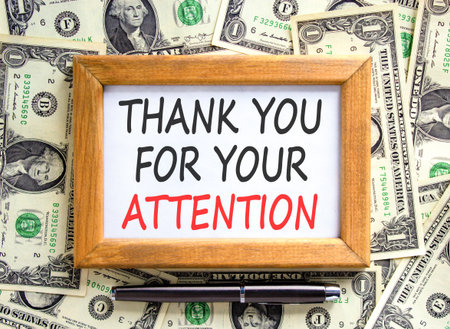 Thank you for your attention symbol. Concept words Thank you for your attention on beautiful white frame. Beautiful dollar bills background. Business thank you for your attention concept. Copy space.の写真素材