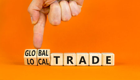 Global or local trade symbol. Concept words Global trade Local trade on beautiful wooden blocks....
