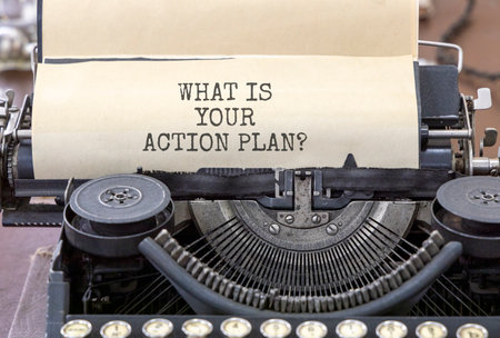 What is your action plan symbol. Concept words What is your action plan typed on beautiful old retro typewriter. Beautiful white paper background. Business what is your action plan concept. Copy spaceの写真素材