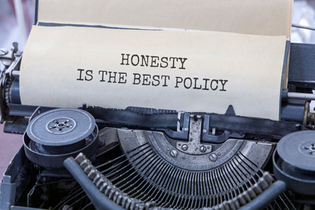 Concept words Honesty is the best policy typed on beautiful old retro typewriter. Beautiful white...