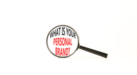 What is your personal brand symbol. Concept words What is your personal brand on beautiful magnifying glass. Beautiful white background. Business what is your personal brand concept. Copy space.の写真素材