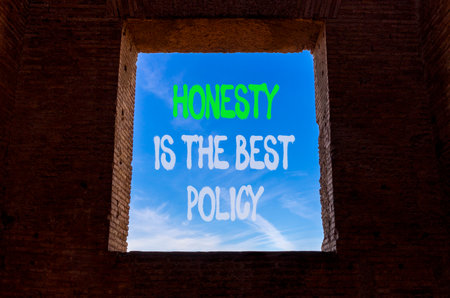 Honesty is the best policy. Concept words Honesty is the best policy on beautiful window in brick wall. Beautiful blue sky background. Business honesty is the best policy concept. Copy space.の写真素材