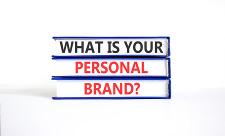 What is your personal brand symbol. Concept words What is your personal brand on beautiful books. Beautiful white paper background. Business what is your personal brand concept. Copy space.の写真素材