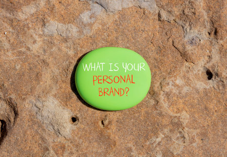 What is your personal brand symbol. Concept words What is your personal brand on beautiful green stone. Beautiful brown stone background. Business what is your personal brand concept. Copy space.の写真素材