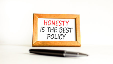 Concept words Honesty is the best policy on beautiful wooden picture frame. Beautiful white background. Business honesty is the best policy concept. Copy space.の写真素材