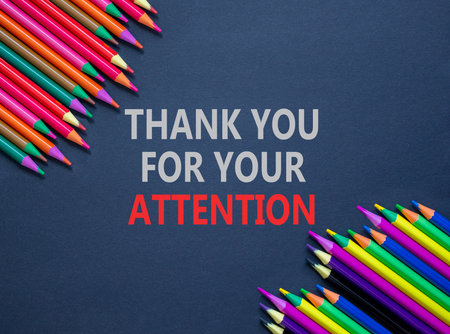 Thank you for your attention symbol. Concept words Thank you for your attention on gray paper. Beautiful gray background. Colored pencils. Business thank you for your attention concept. Copy space.の写真素材