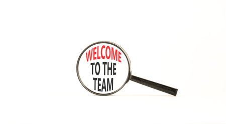 Support, help welcome to the team symbol. Concept words Welcome to the team on beautiful magnifying glass. Beautiful white background. Business welcome to the team concept. Copy space.の写真素材