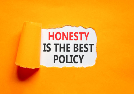 Honesty is the best policy. Concept words Honesty is the best policy on beautiful white paper. Beautiful orange paper background. Business honesty is the best policy concept. Copy space.の写真素材