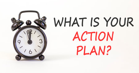 What is your action plan symbol. Concept words What is your action plan on beautiful white paper. Beautiful white background. Black alarm clock. Business what is your action plan concept. Copy space.の写真素材