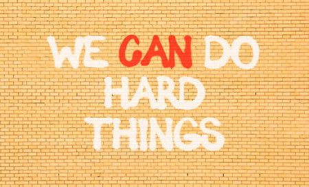Support, help we can do hard things symbol. Concept words We can do hard things on beautiful brown...