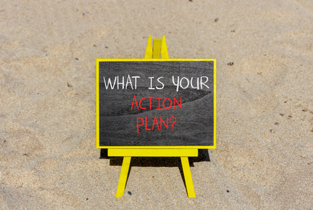 What is your action plan symbol. Concept words What is your action plan on beautiful blackboard. Beautiful sand beach background. Business what is your action plan concept. Copy space.の写真素材