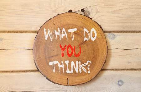 Support, help what do you think symbol. Concept words What do you think on beautiful wooden circle. Beautiful wooden wall background. Business what do you think concept. Copy space.の写真素材