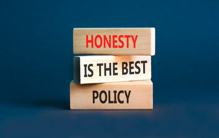 Honesty is the best political symbol. Concept words Honesty is the best policy on beautiful wooden blocks. Beautiful gray background. Business honesty is the best policy concept. Copy space.の写真素材