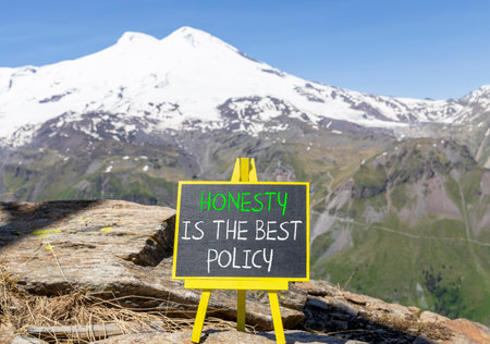 Concept words Honesty is the best policy on beautiful blackboard. Beautiful mountain Elbrus...