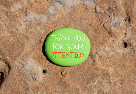 Thank you for your attention symbol. Concept words Thank you for your attention on beautiful green stone. Beautiful brown stone background. Business thank you for your attention concept. Copy space.の写真素材