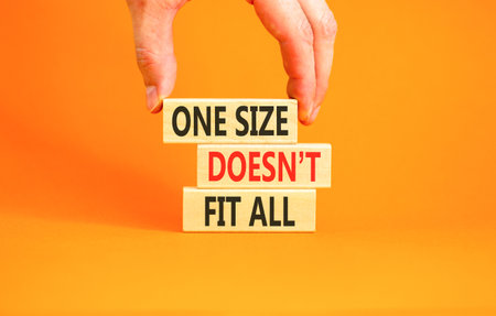 One size does not fit all symbol. Concept words One size does not fit all on beautiful wooden...