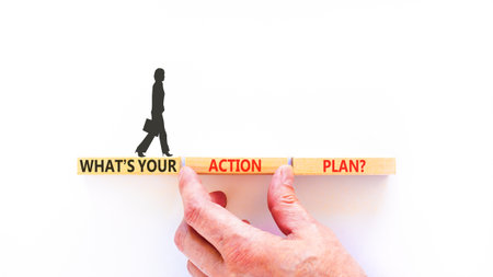 What is your action plan symbol. Concept words What is your action plan on beautiful blocks. Beautiful white background. Businesswoman's icon. Business what is your action plan concept. Copy space.の写真素材