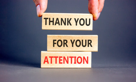 Thank you for your attention symbol. Concept words Thank you for your attention on beautiful wooden blocks. Beautiful gray background. Business thank you for your attention concept. Copy space.の写真素材