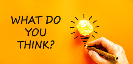 Support, help what do you think symbol. Concept words What do you think on beautiful orange paper. Beautiful orange background. Businessman's hand. Business what do you think concept. Copy space.の写真素材