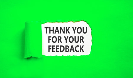 Thank you for your feedback symbol. Concept words Thank you for your feedback on beautiful white paper. Beautiful green paper background. Business thank you for your feedback concept. Copy space.の写真素材
