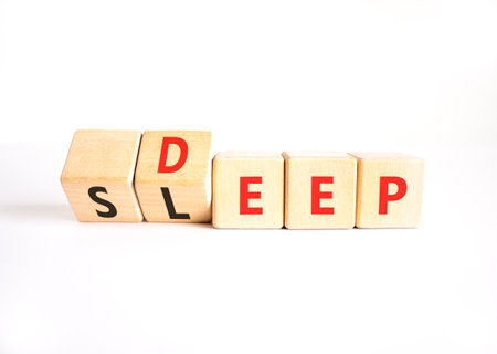 Deep sleep symbol. Concept words Deep sleep on beautiful wooden cubes. Healthy lifestyle, medical and deep sleep concept. Copy space.の写真素材