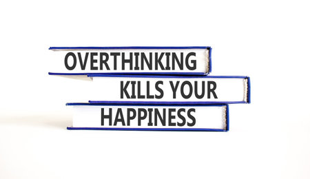 Overthinking kills your happiness symbol. Concept words Overthinking kills your happiness on books....