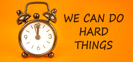 Support, help we can do hard things symbol. Concept words We can do hard things on beautiful orange...
