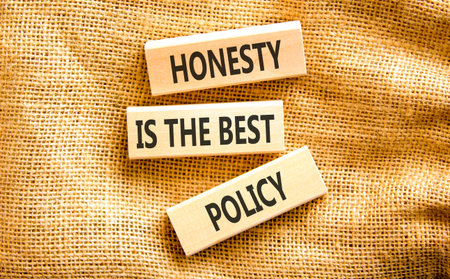 Honesty is the best policy. Concept words Honesty is the best policy on beautiful wooden blocks. Beautiful canvas background. Business honesty is the best policy concept. Copy space.の写真素材