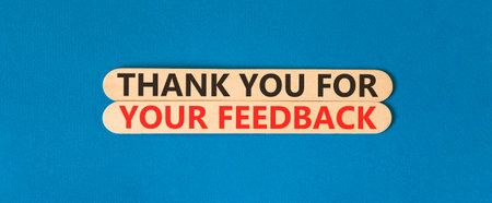 Thank you for your feedback symbol. Concept words Thank you for your feedback on beautiful wooden sticks. Beautiful blue background. Business thank you for your feedback concept. Copy space.の写真素材