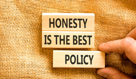 Concept words Honesty is the best policy on beautiful wooden blocks. Beautiful canvas background. Business honesty is the best policy concept. Copy space.の写真素材