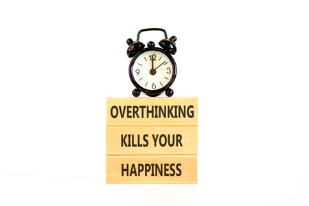 Overthinking kills your happiness symbol. Concept words Overthinking kills your happiness on wooden...