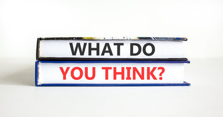 Support, help what do you think symbol. Concept words What do you think on beautiful books. Beautiful white paper background. Business what do you think concept. Copy space.の写真素材