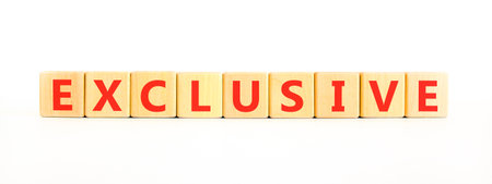 Exclusive symbol. Concept words Exclusive on beautiful wooden blocks. Beautiful white background....