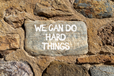 Support, help we can do hard things symbol. Concept words We can do hard things on beautiful gray stone. Beautiful stone wall background. Business we can do hard things concept. Copy space.の写真素材